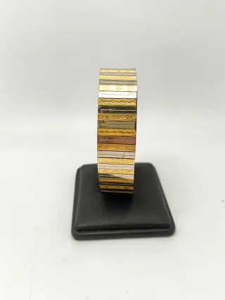 Pulsera Oro 18kt Chapas talladas bicolor