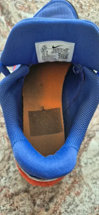 Zapatillas Adidas niño azul/naranja.