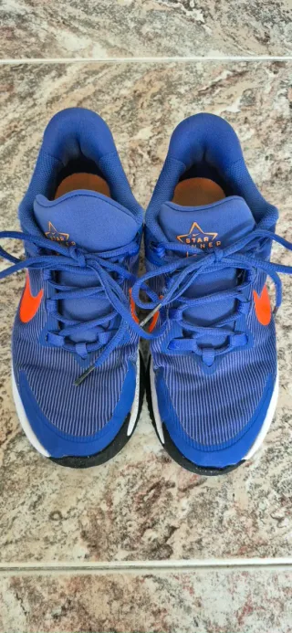 Zapatillas Adidas niño azul/naranja.