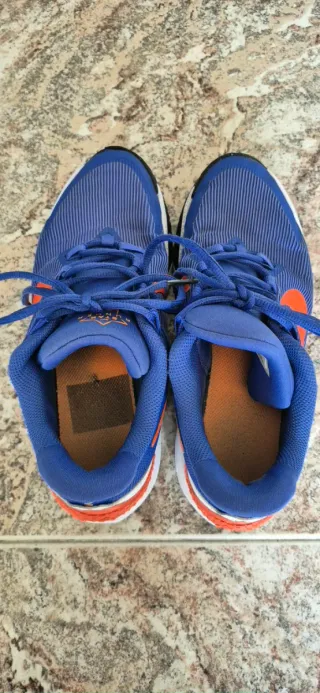 Zapatillas Adidas niño azul/naranja.