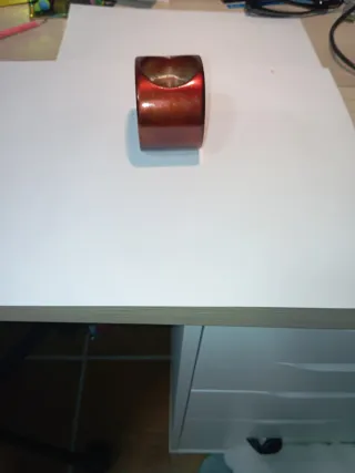 Portavelas decorativo marrón y dorado