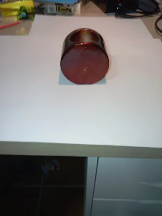 Portavelas decorativo marrón y dorado