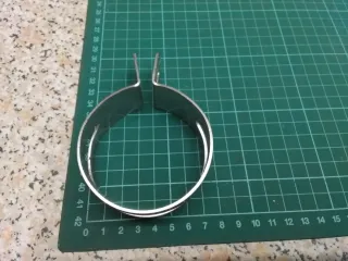 Abrazadera TAVI para silencioso