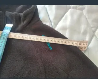 Forro polar negro de mujer de Quechua.