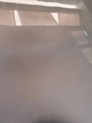 Tavolo da giardino in vetro e metallo