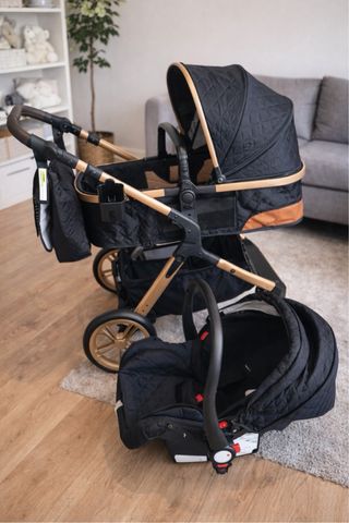 Carrito bebé 3 en 1 NUEVO negro y dorado