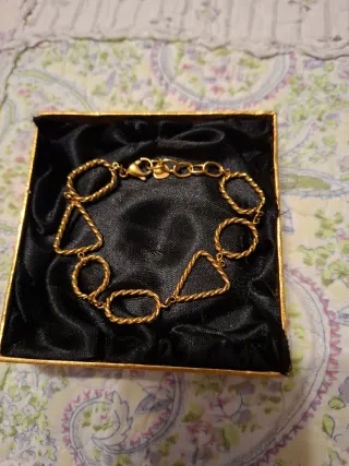 Pulsera de acero dorada