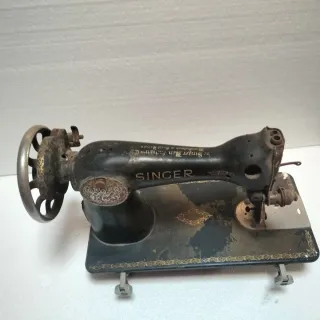 Máquina de coser Singer Inglesa antigua para resta