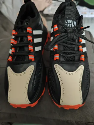 Zapatillas Hombre Negras y Naranjas