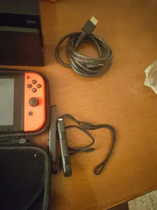 Nintendo Switch Azul y Naranja, incluye dos juegos