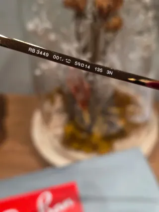 Gafas de sol Ray-Ban doradas y marron