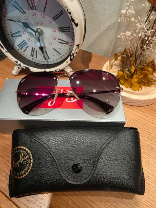 Gafas de sol Ray-Ban doradas y marron