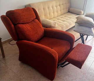 Sillón relax eléctrico terapéutico naranja.