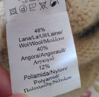 Jersey Massimo D. cuello alto beige dorado angora