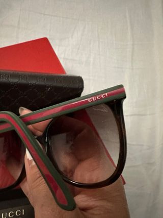 Gafas de sol Gucci negras y marrones