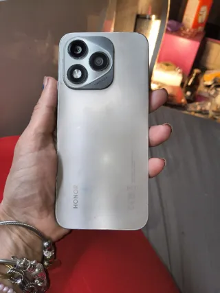 Teléfono móvil negro/plateado semi nuevo