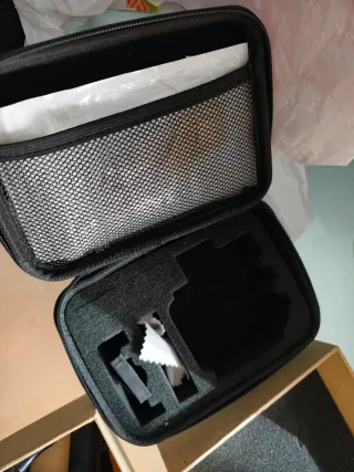 Cámara Xiaomi Yi con accesorios y funda