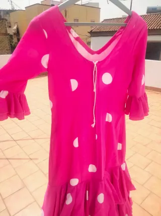 Traje de flamenca rosa lunares