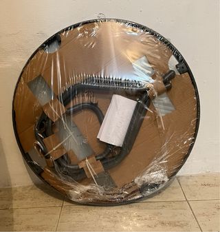 Mesa redonda de cristal y hierro forjado