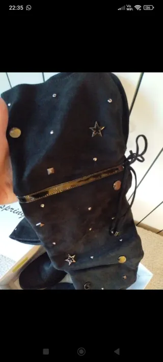 Stivali alti neri con borchie