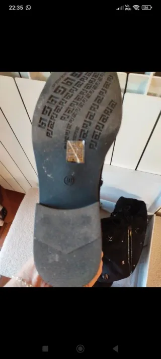 Stivali alti neri con borchie