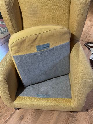 Sillón amarillo de tela