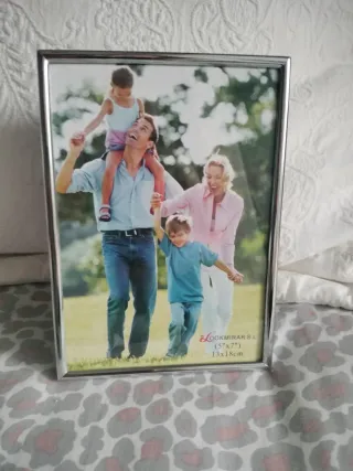 Cornice per foto in metallo argentato