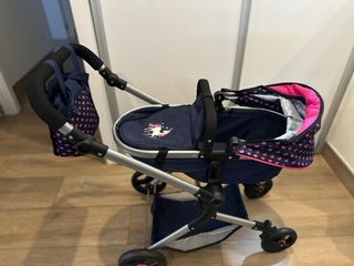 Carro de muñecas y muñeca reborn.