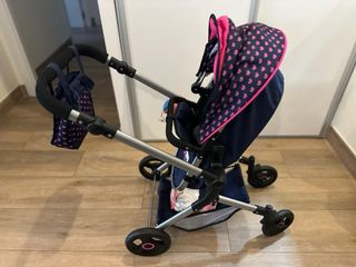 Carro de muñecas y muñeca reborn.
