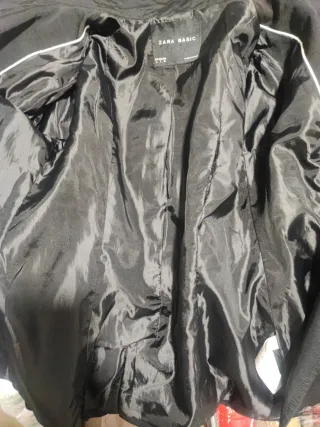 gabardina o "trench coat" negro