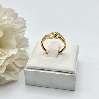 Anillo de oro 18kt con diamante