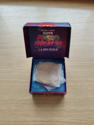 Moneda Libro Estela McDonald's Super Mario Galaxy