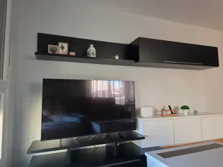 Composición de muebles de madera para salón