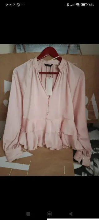 Blusa rosa con volantes