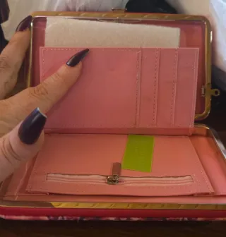 Cartera con frase motivacional