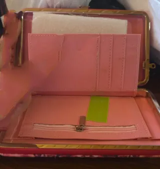 Cartera con frase motivacional