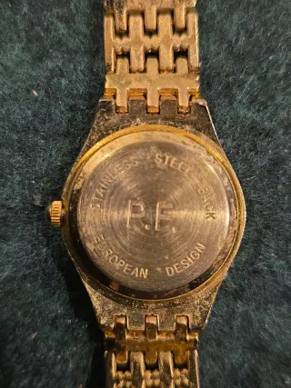 Mini reloj P.F. dorado