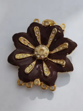 Chiusura fermaglio fiore nero oro strass