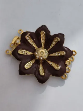 Chiusura fermaglio fiore nero oro strass