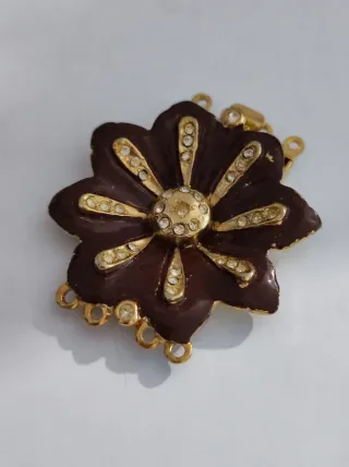 Chiusura fermaglio fiore nero oro strass