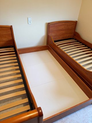 Camas de madera con cama auxiliar
