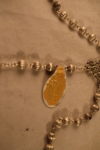 Bonito rosario de plata maciza en perfecto estado