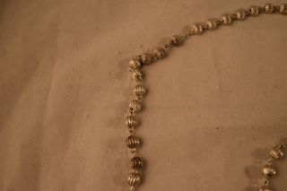 Bonito rosario de plata maciza en perfecto estado