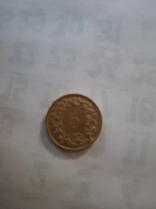 Moneda antigua con retrato