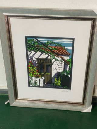 Cuadro de casa con enredadera