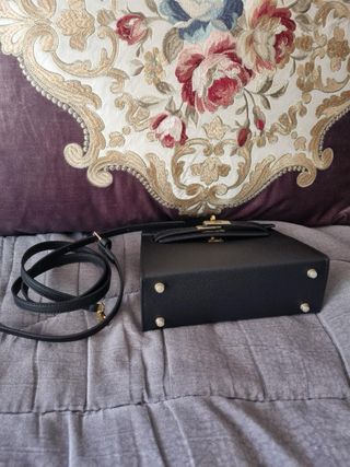 Bolso Hermes Negro y Dorado