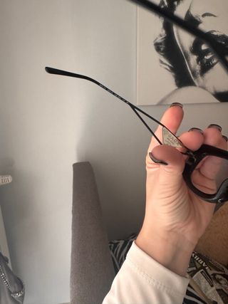 Occhiali da sole neri mai usati