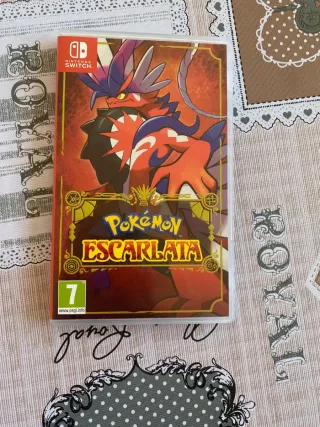 Nintendo switch 1 negro y naranja + un juego