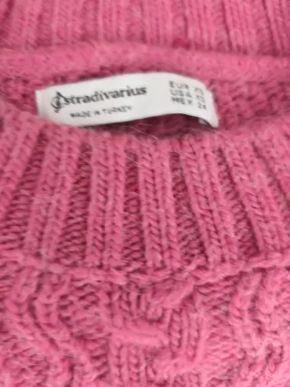 Jersey de punto rosa trenzado