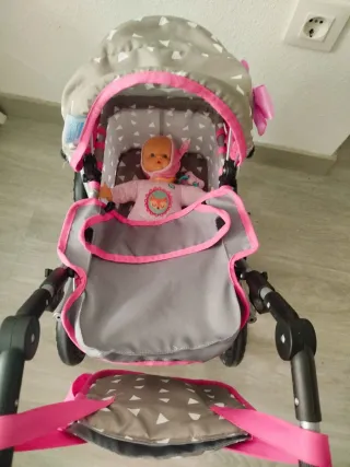 Carrito de muñecas con bolso y lazo